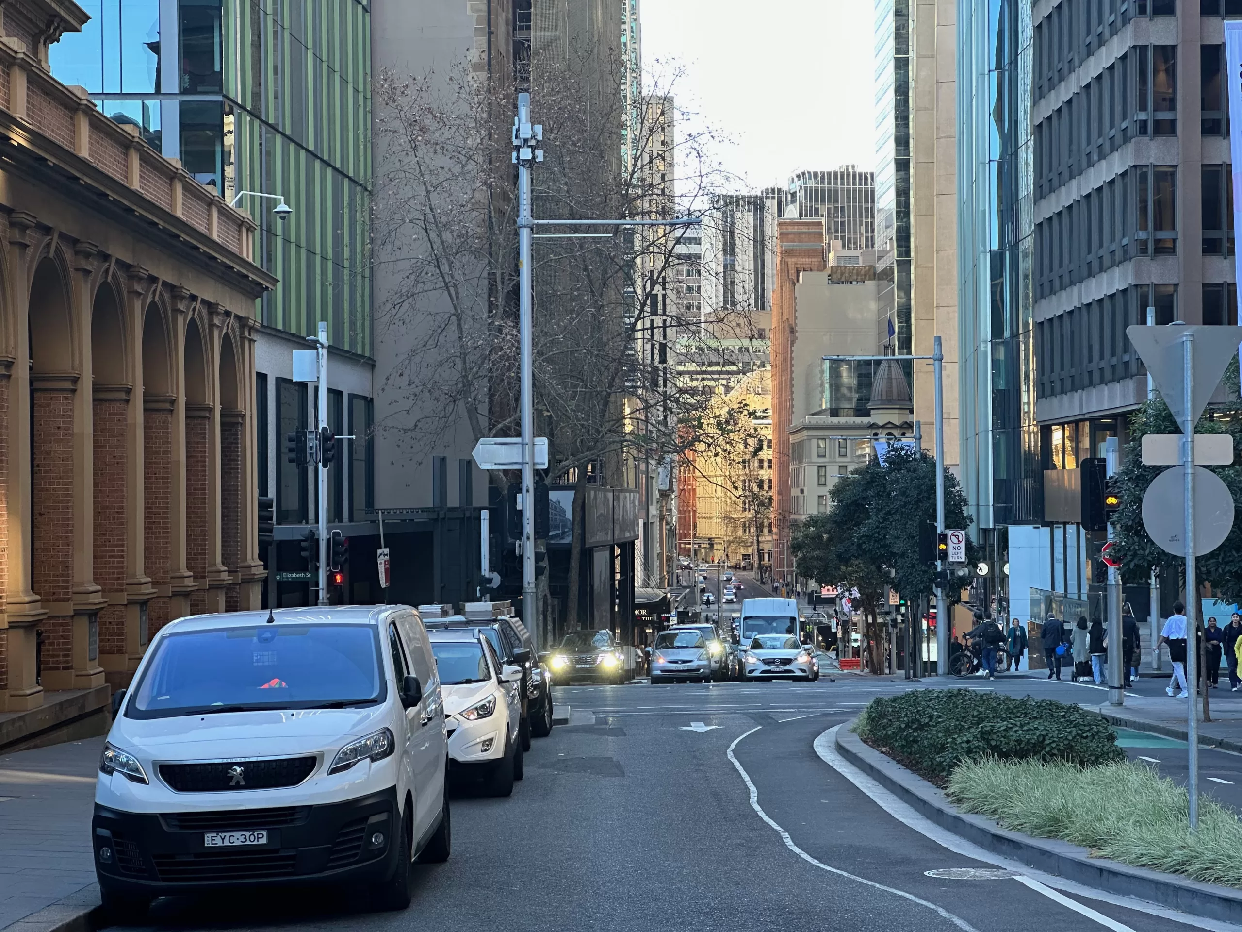 A bustling street in Sydney CBD, where avoiding mistakes when choosing a property lawyer is crucial for navigating the intricate landscape of commercial real estate.