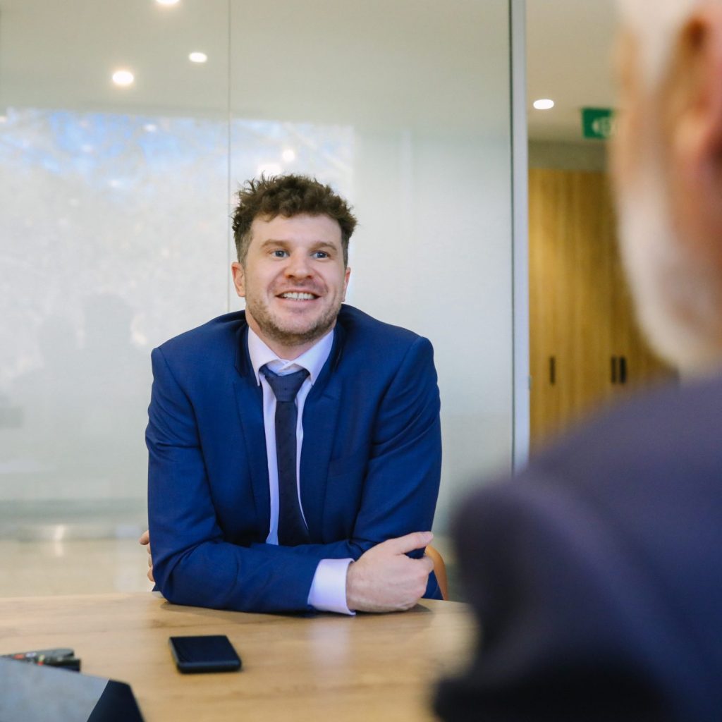 Joelon Fincher listening to a commercial law client.